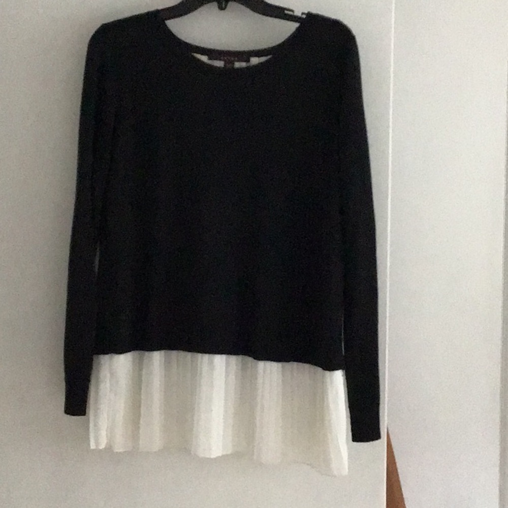 Sweater with attached pleated bottom